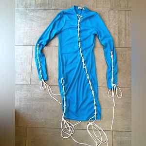 Turquoise dress with fun ties to adjust the fit - lots of skin or a little? 🌺🌺